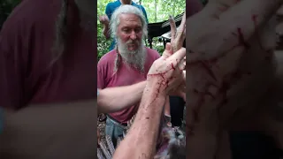 Mountain Man Eustace Conway gives lessons on skinning turkey