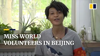 Former Miss World from Africa volunteers at a Beijing Covid-19 testing site