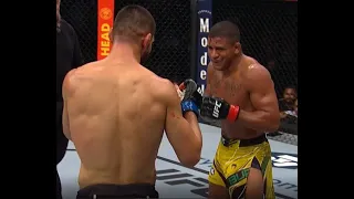 Gilbert Burns kicks Khamzat Chimaev off him then smiles