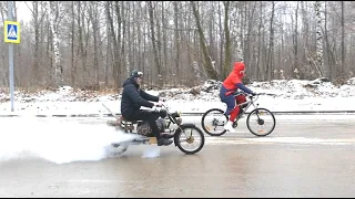 Steam motorcycle.  Who is faster?