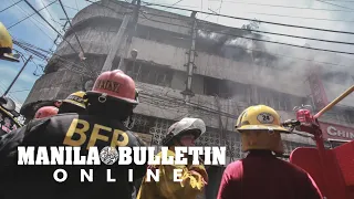 Firefighters battle commercial building fire in Divisoria, Manila