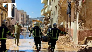 Libya floods: Rescuers search through ruins for survivors