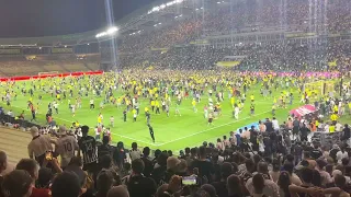 Full time, Nantes vs SCO. Nantes stay in Ligue 1, just… pitch invasion!!