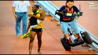Chinese cameraman have an accident whit Usain Bolt