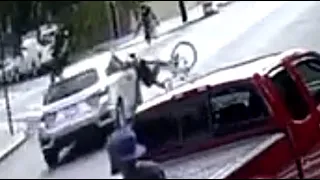 Dramatic video shows car crash into bicycle, nearly ending in tragedy; driver charged