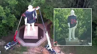 Texans unveil 'new look' with  200 Lb.  jersey on Sam Houston statue in Huntsville