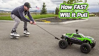 Traxxas Xmaxx 8S pulling Roller blades and towing a Truck