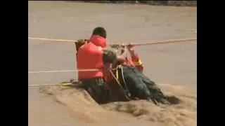 Firefighters rescue herdsmen trapped in flood waters | CCTV English