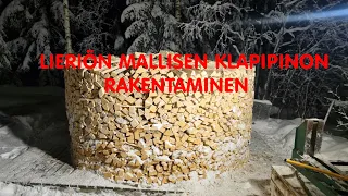 Rakennetaan puupino ympyrän muotoon - Stacking fire wood in a circle