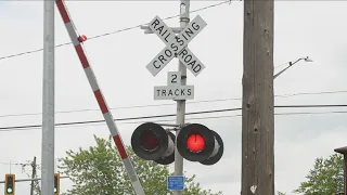 Passenger train strikes truck; crash victims are 2 adults, boy