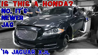 Not another boring car! This '14 Jaguar XJL is anything but boring. CAR WIZARD is very surprised