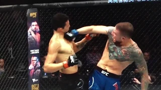 Spinning backfist tko Bravo vs Peterson (R2 1:31)