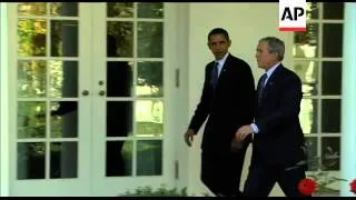 President-Elect Barak Obama and President Bush walk along the colonnade at the White House