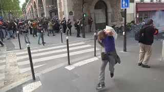 Paris police use tear gas to disperse protesters during May Day march