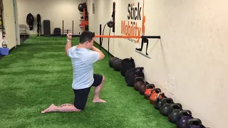 Psoas And T-Spine Rotational Stretch - Stick Mobility Exercises