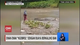 Emak-emak 'Ngobrol' dengan Buaya Berkalung Ban