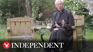 Cathedral cat disrupts sermon...by disappearing into Dean of Canterbury's robes