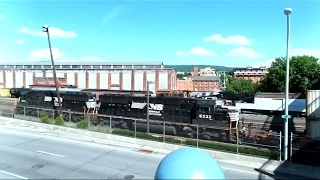 Norfolk Southern Train Goes By A Train Grave Yard