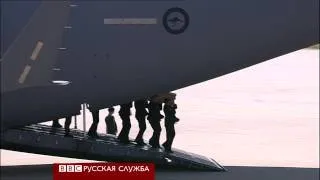 Тела погибших пассажиров МН17 прибыли в Нидерланды - BBC Russian