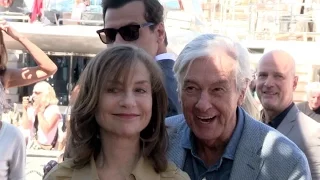 Isabelle Huppert, Paul Verhoeven, Virgina Efira and rest of the cast at the Elle photocall in Cannes