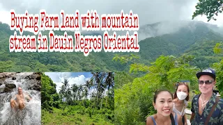 Buying property in Dauin Negros Oriental with mountain stream