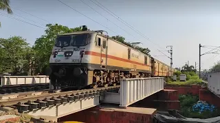 13141 Teesta Torsa express crossing a small canal | Sealdah WAP7