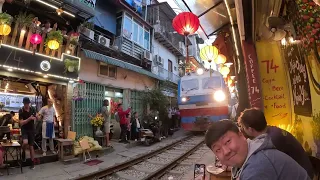 Train going through train street! (Note: it's a very long train)