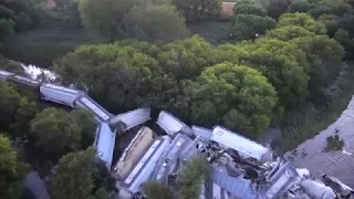 USA. Cargo train derails on Iowa river