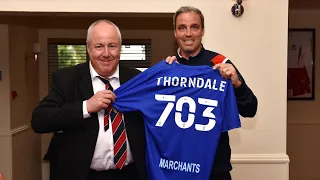 Michael Duff presents the new 703 away shirt to Rob Thorndale