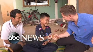 11-year-old Thai soccer player held onto coach's back during rescue