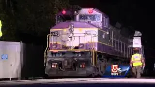 Driver hurt in violent collision with train
