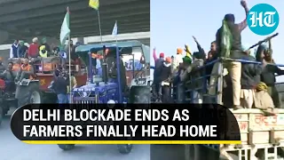 Watch: Farmers in Delhi borders begin journey back home ending year-long protest | Farm laws