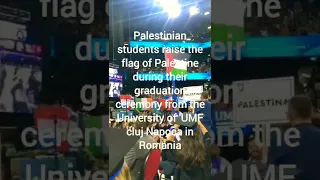 Palestinian students raise the flag