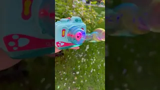 Іграшковий фотоапарат мильні бульбашки