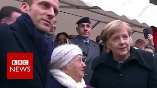 Old lady mistakes Chancellor Merkel for Macron's wife - BBC News