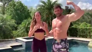 Zack Ryder pushes Chelsea Green into their pool