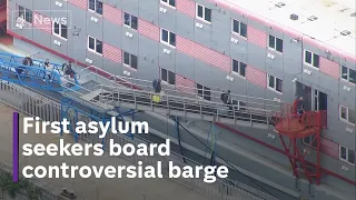 First group of 15 asylum seekers board Bibby Stockholm barge in Dorset