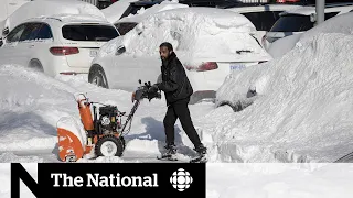 Central Canada digs out after snow dump