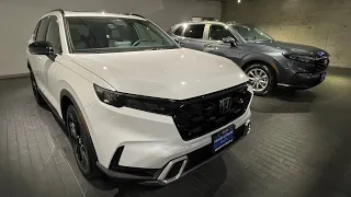 2023 CR-V Hybrid Sport Touring side by side 2023 CR-V EX-L