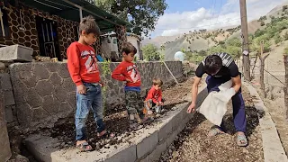 Happy rural family.  Babak and the children planted vegetable seeds in the garden