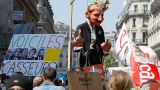 Emmanuel Macron's election anniversary met with protests across Paris