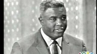 Jackie Robinson talks with Ed Sullivan