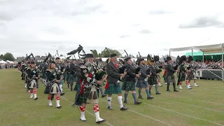 Scotland the Brave as the Massed Bands march off after opening of the 2022 Aboyne Highland Games