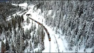 Donner Summit [4K] Aerial View of a Union Pacific Freight Over Snow Shed 47 & above Donner Lake!