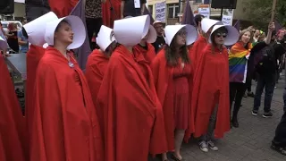 Anti-Trump "Handmaids" protest in Warsaw