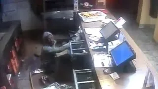 Watch This Clumsy Burglar Fall Through a Popeye's Ceiling