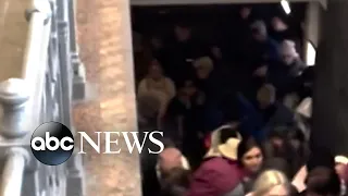 Hundreds wait to board at train station in Ukraine