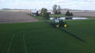 John Deere 4830 Spraying Spring Wheat and Folding In Its Booms