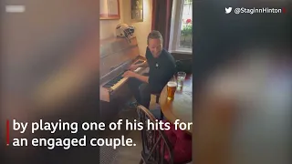 Chris Martin: Coldplay's Chris Martin plays couple's wedding song in pub