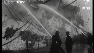 Warship on fire at the Liverpool dock (1946)